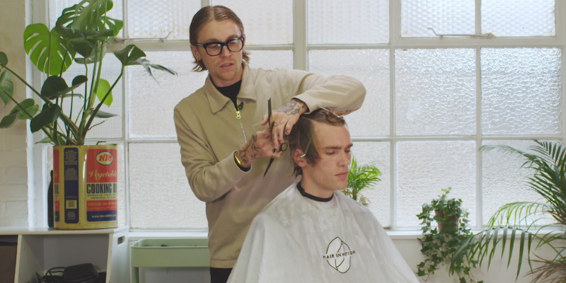 How to be the best hairdresser: image of Charlie Gray doing a hair cut