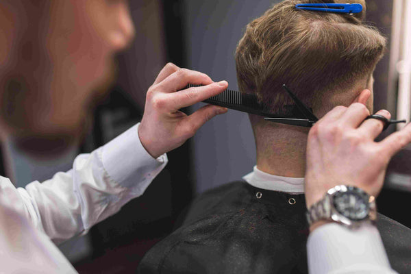Learn how to cut men's hair with hairdressing scissors