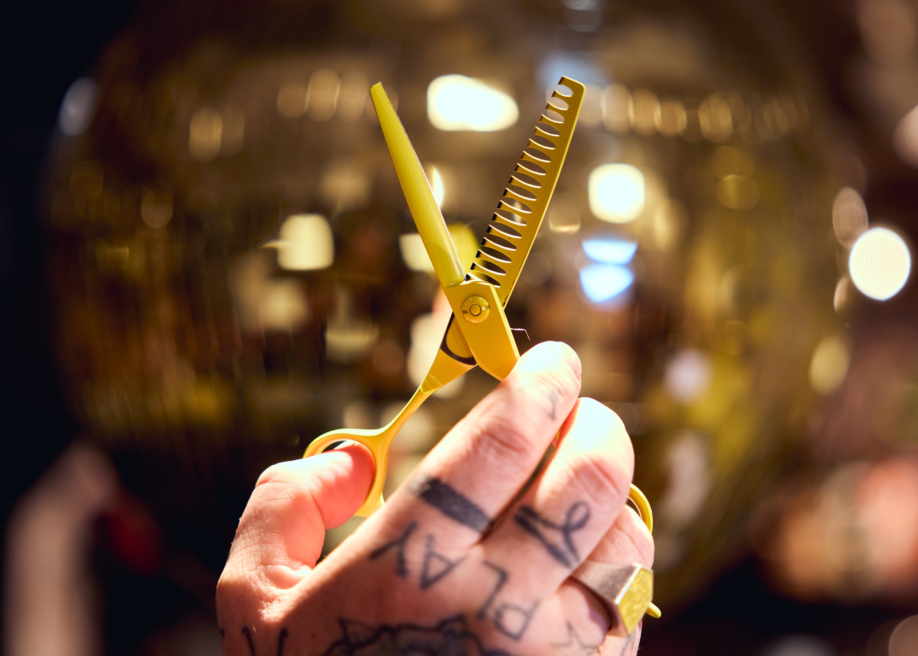 Adam Reed holding the open Leaf Yellow Shatter Shear