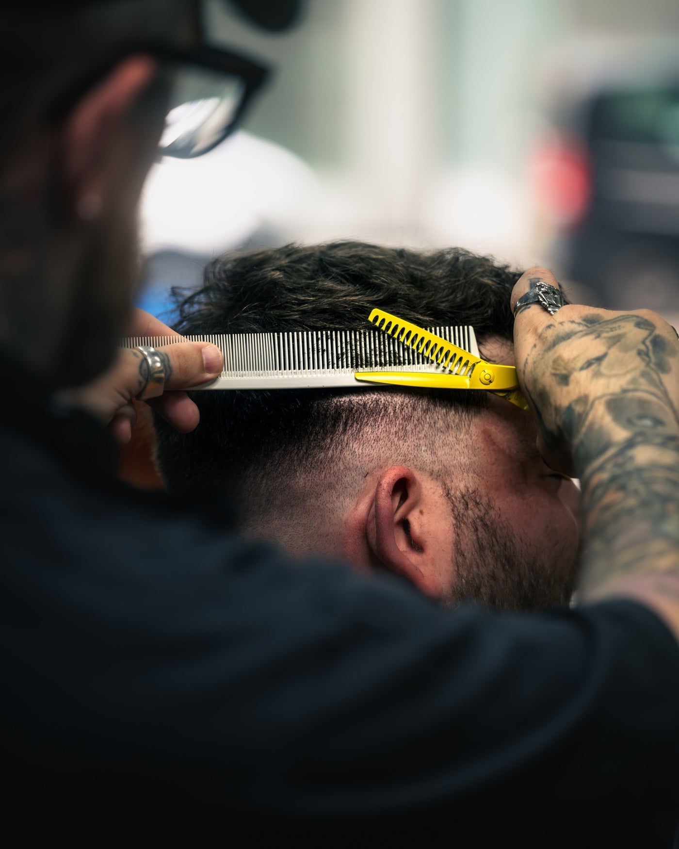 Leaf x ARKIVE Yellow Shatter Shear creating texture with scissor-over-comb technique